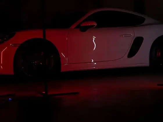 Deep hydrophobic gloss on a white Porsche after a ceramic coating by Impeccable Mobile Car Detailing in Los Angeles